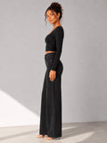 Camille Jane Sculpt Mid-Rise Jeans in black — full length side view