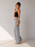 Camille Jane Sculpt Mid-Rise Jeans in grey wash — full length side view