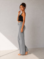 Camille Jane Sculpt Mid-Rise Jeans in grey wash — full length side view