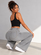 Camille Jane Sculpt Mid-Rise Jeans in grey wash — seated view