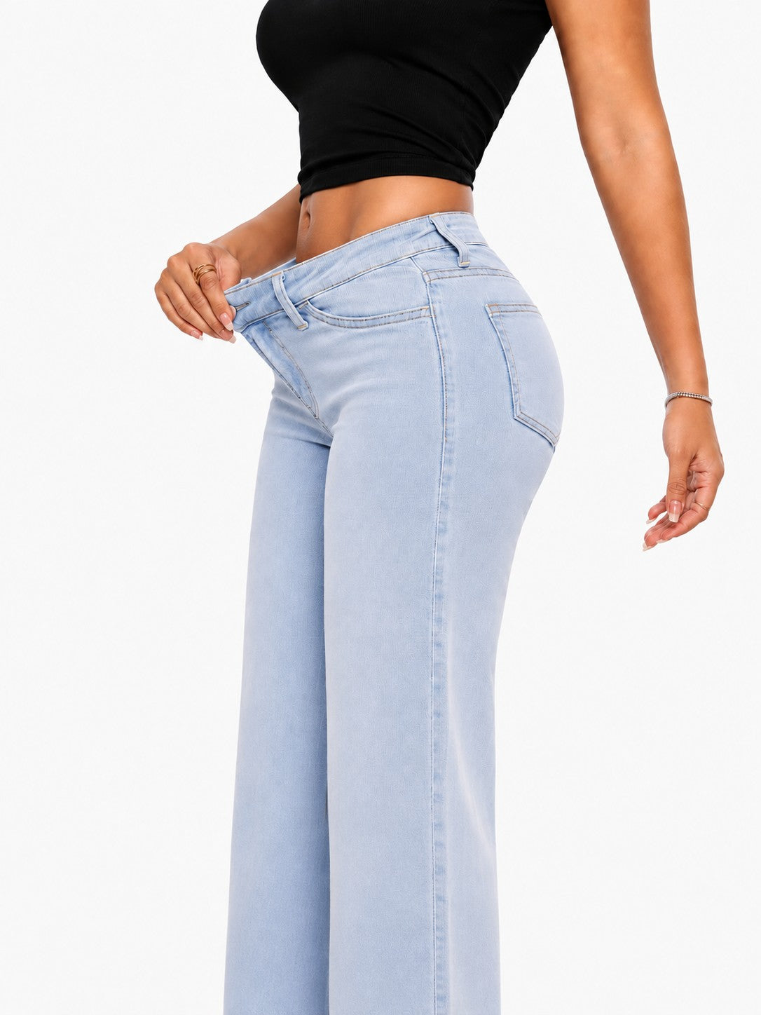 Stretch denim waistband detail — vertical format