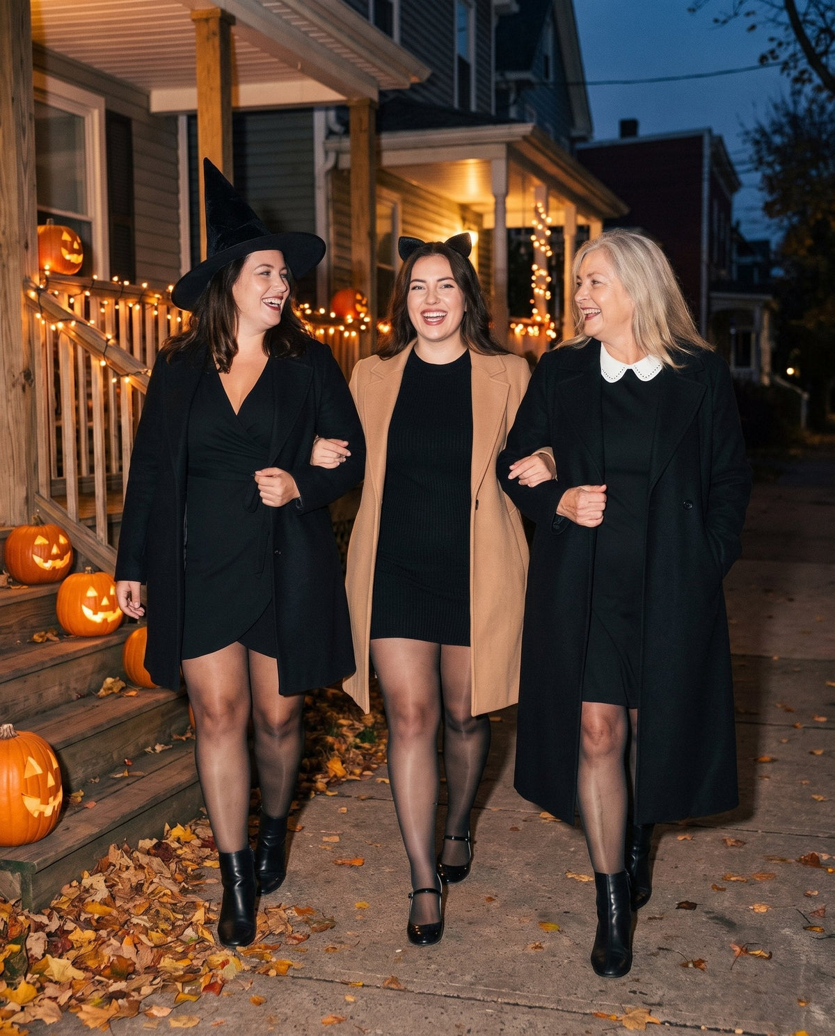 Three friends in Halloween costumes and sheer-look black tights on Halloween night