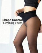 Hand pulling the high shaping waistband that flattens the tummy